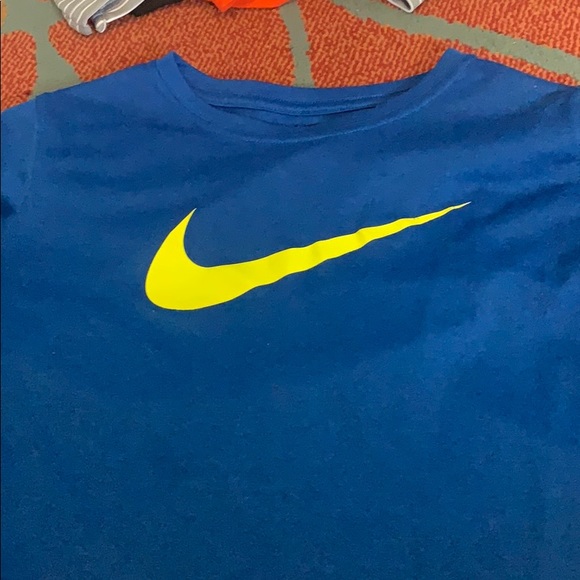 yellow and blue nike shirt